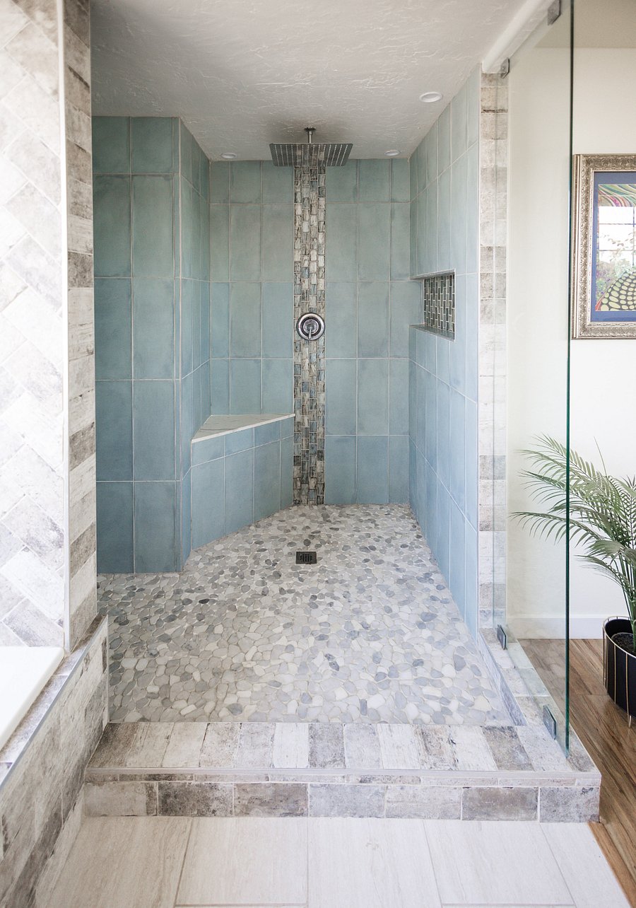 En-suite rainfall shower in primary bedroom