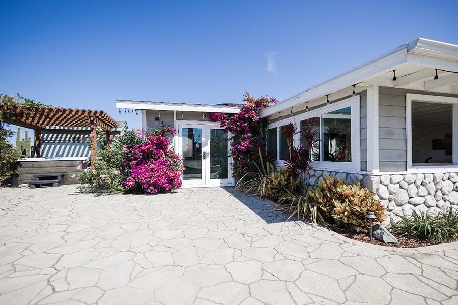 Private backyard and entrance to primary bedroom