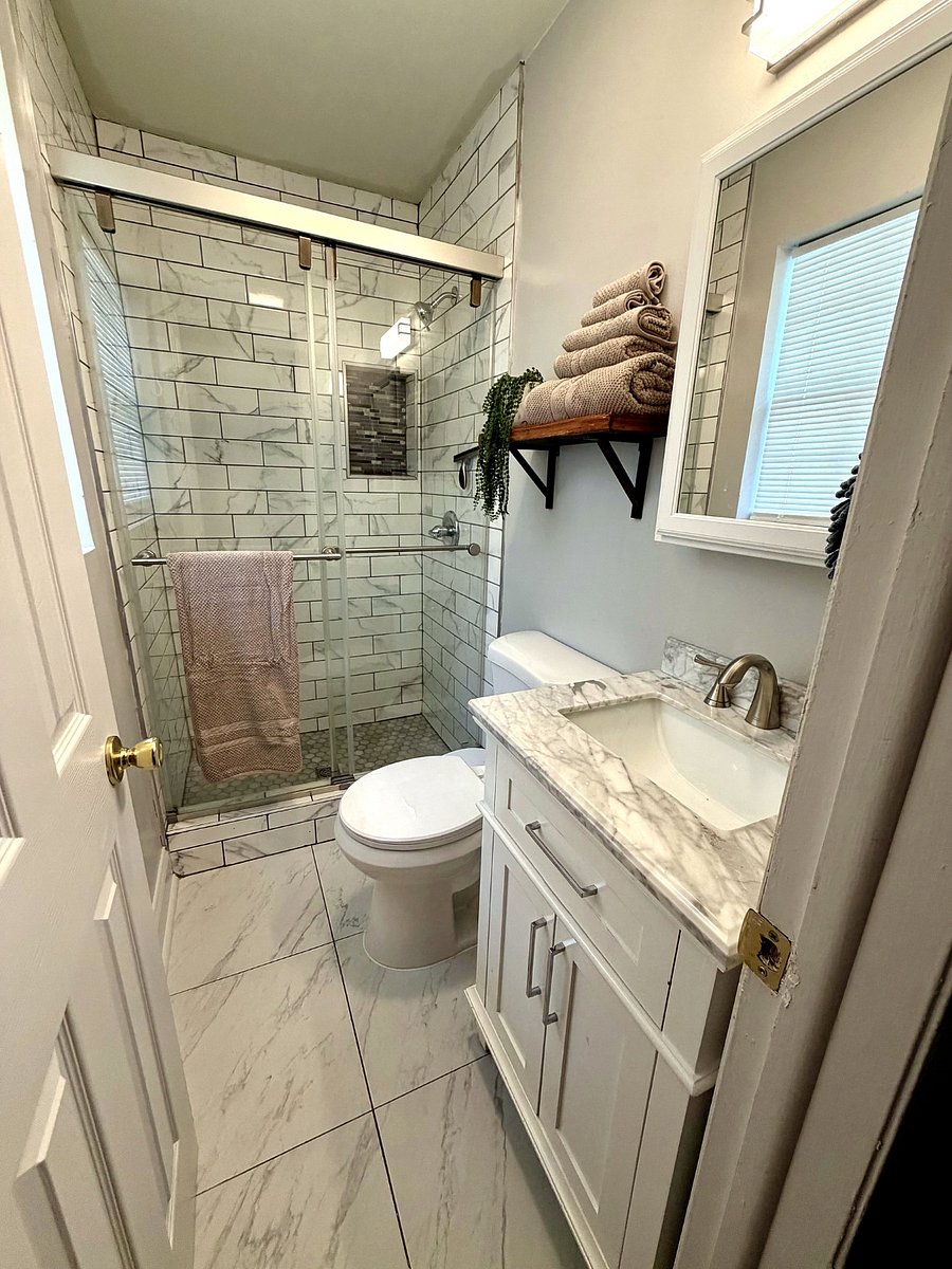 Primary bathroom with glass rain shower