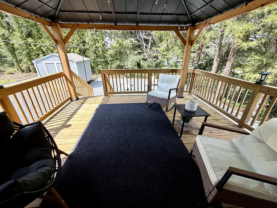 Covered back deck overlooking the yard