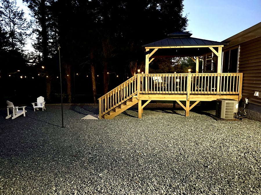 Back deck and string lights at dusk