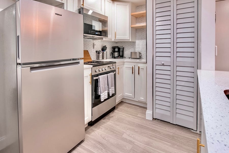 Stay Fresh, Dine in Style Experience comfort and convenience with our Airbnb's modern kitchen and generously-sized refrigerator.