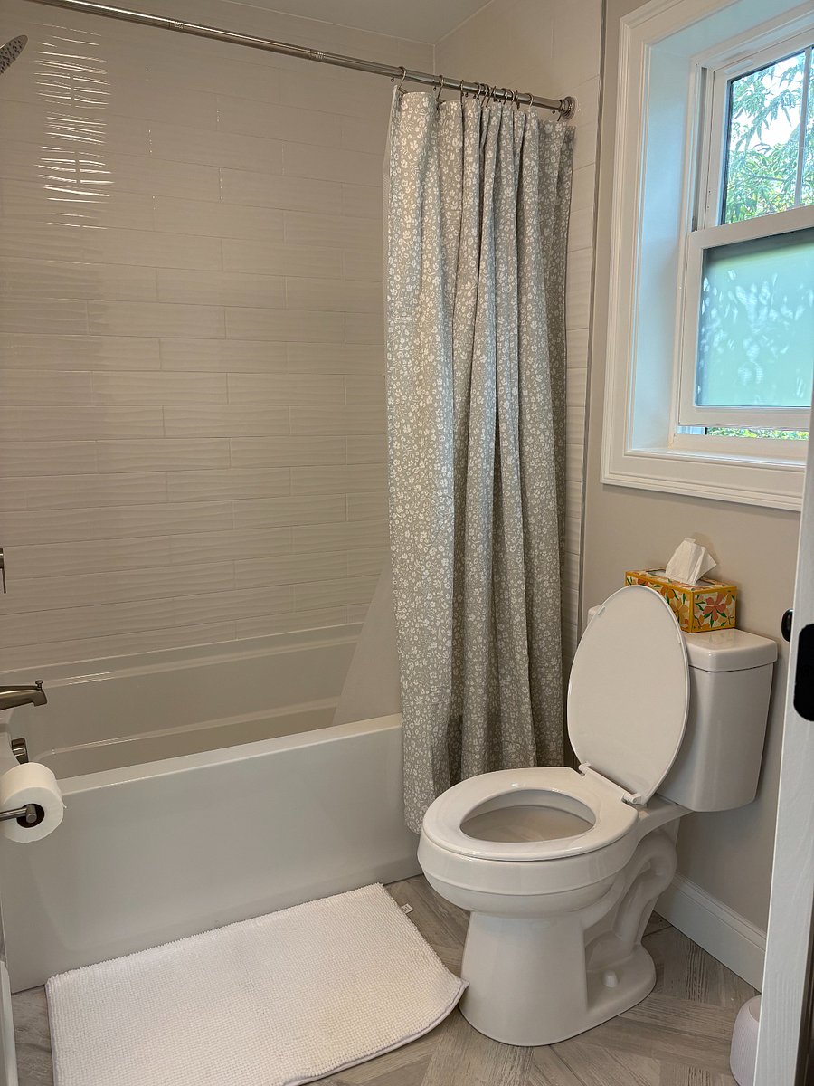 Guest bathroom with full size tub