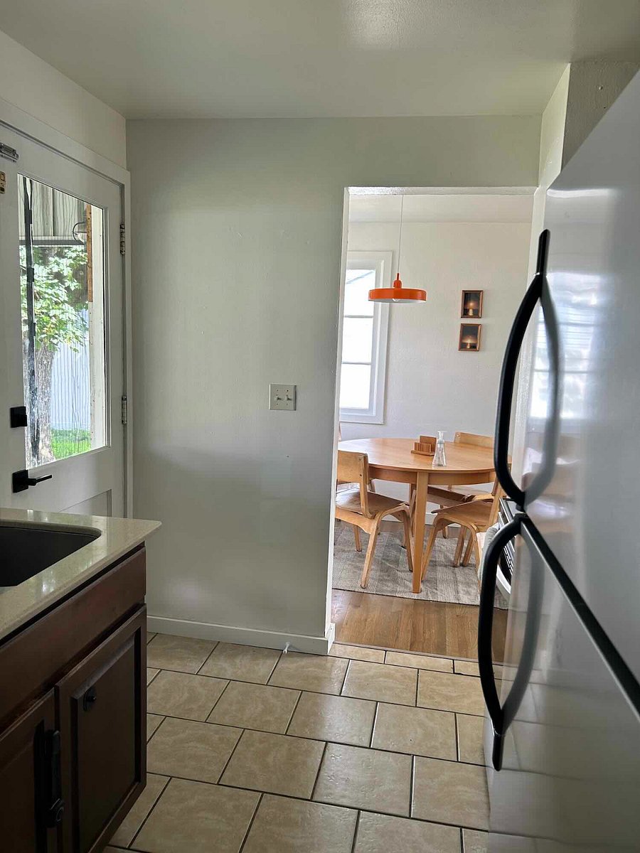 From Kitchen to Dining area and backyard entrance 