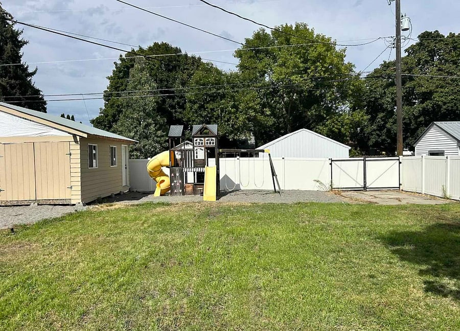 Huge backyard with play area for kids and plenty of space to garden, hang and relax. 