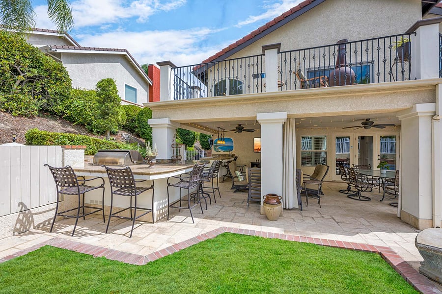 Custom Built Outdoor Living at its finest. You can host great parties out here with a heated if needed outdoor room, curtains for shade if needed, imagine the football or baseball game while enjoying the pool and Jacuzzi too!
