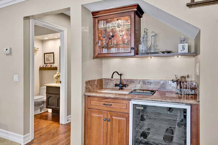 Plenty of counter space, cabinetry galore, and a nice Wine fridge below.