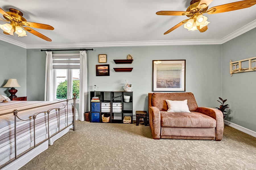 Your Guest Bedroom #1 used to be two smaller bedrooms, now a HUGE bedroom for your cherished guests, two lit ceiling fans, tons of natural light and brightness.