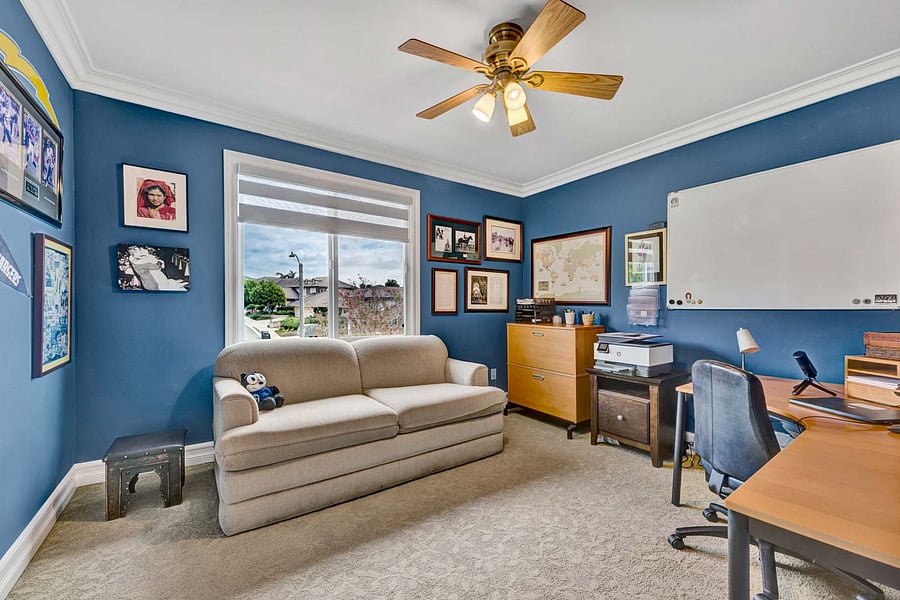 Here is Guest Bedroom #2, also can be used for an office with custom cabinetry, filing cabinet, and walk-in closet or storage area.