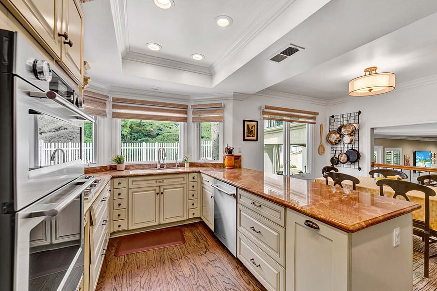 Upgrades at every turn including this gorgeous kitchen with all new stainless appliances, Kitchen-Aid Gas Five burner cooktop with downdraft, high end dishwasher, and Convect Oven/Microwave combo with a newer LG Refrigerator / Freezer two door.