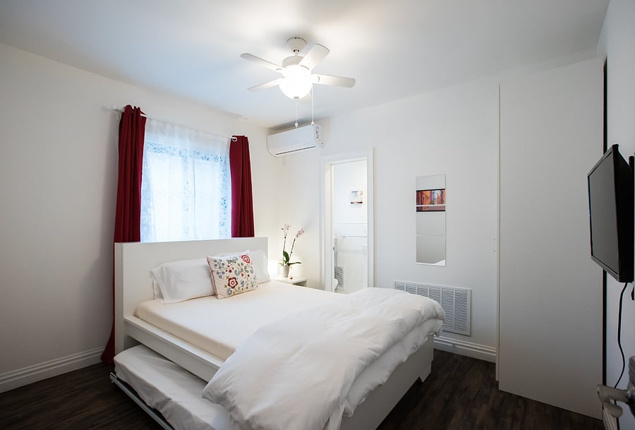 Thoughtfully designed bedroom with everything you need for a relaxing stay.