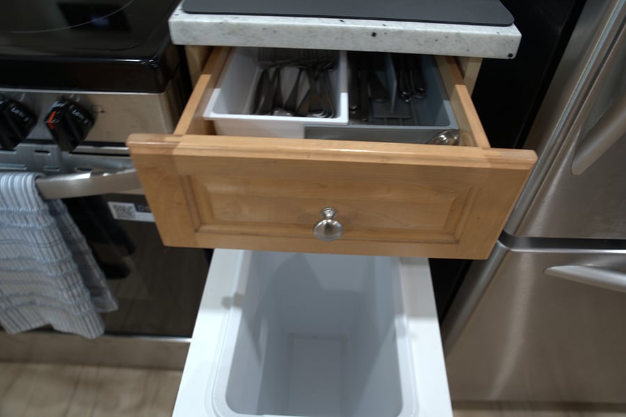 Cookingware, utensils, and built-in garbage cabinet