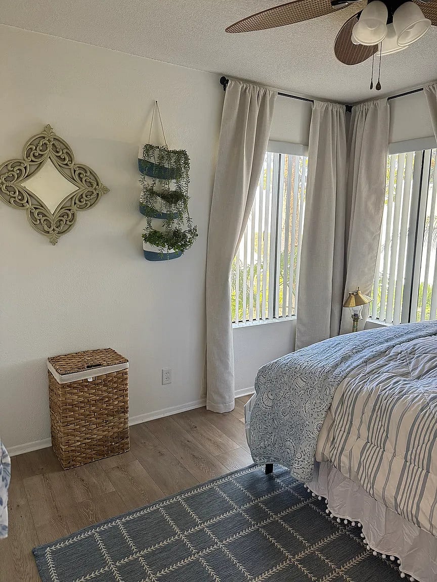 Second bedroom with Queen bed, large closet, and gorgeous views of stream and landscaping.