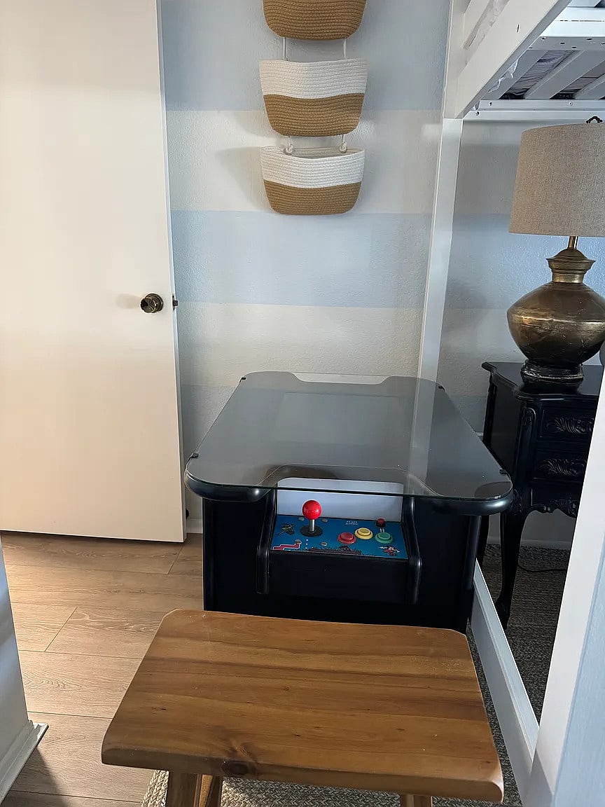 Cocktail game table with two stools. Has 60 vintage games like Pacman, Centipede, and Donkey Kong!!!