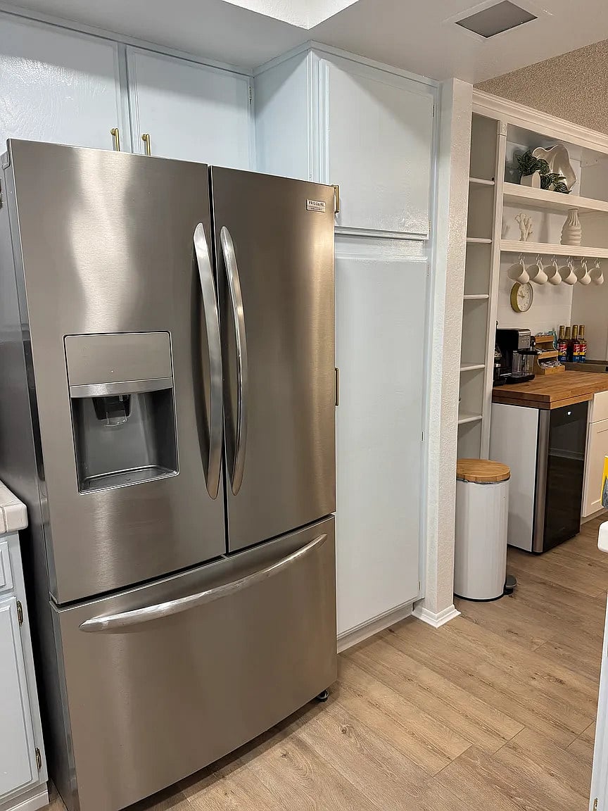 Kitchen with new oven and dishwasher and equip with absolutely everything from blender to fondue pots!