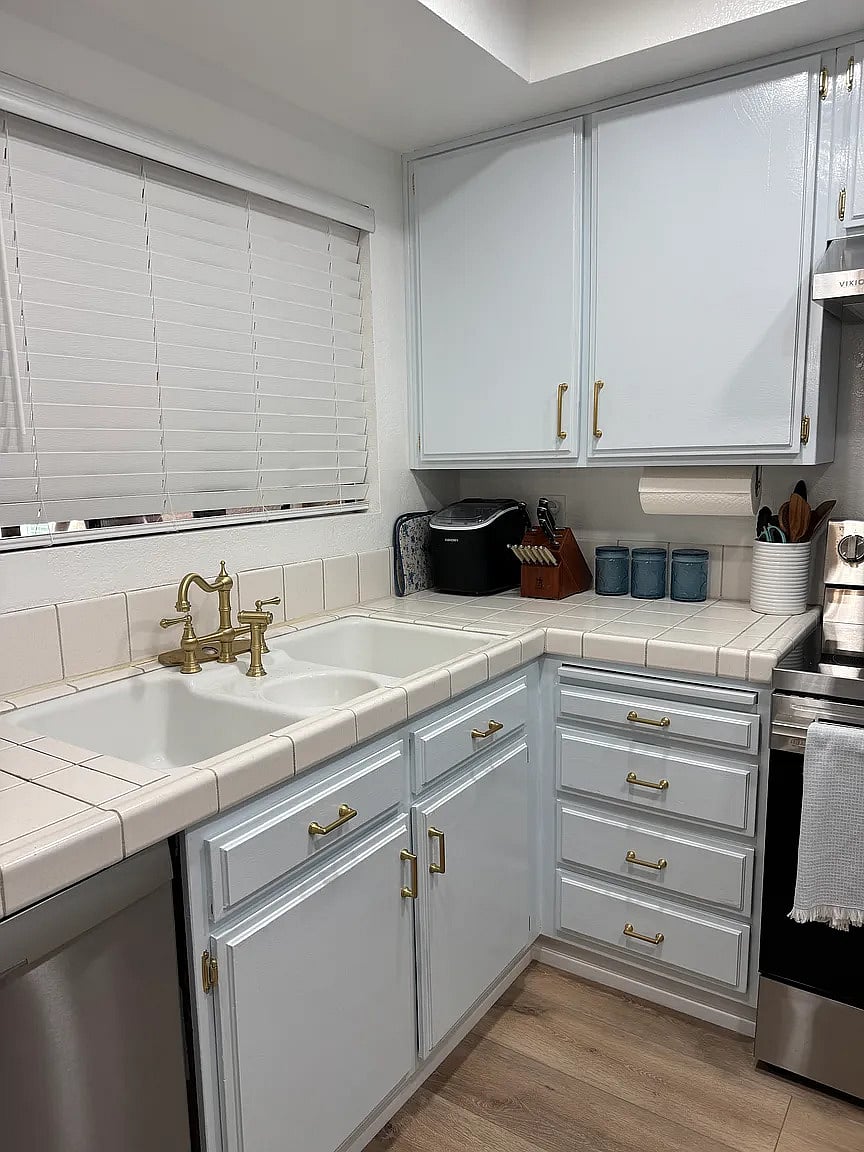 Kitchen with new oven and dishwasher and equip with absolutely everything from blender to fondue pots!