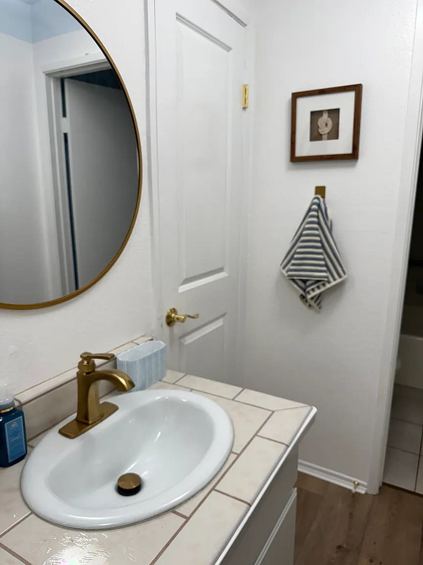Master bath with walk-in closet, two sinks, shower, and large bathtub! Well appointed with hangers in closet, shampoo, conditioner, body wash, tooth brushes, brush, and blow dryer.