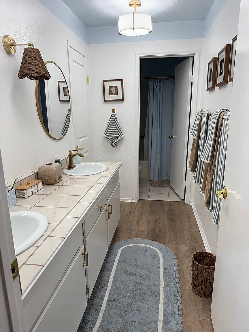 Master bath with walk-in closet, two sinks, shower, and large bathtub! Well appointed with hangers in closet, shampoo, conditioner, body wash, tooth brushes, brush, and blow dryer.
