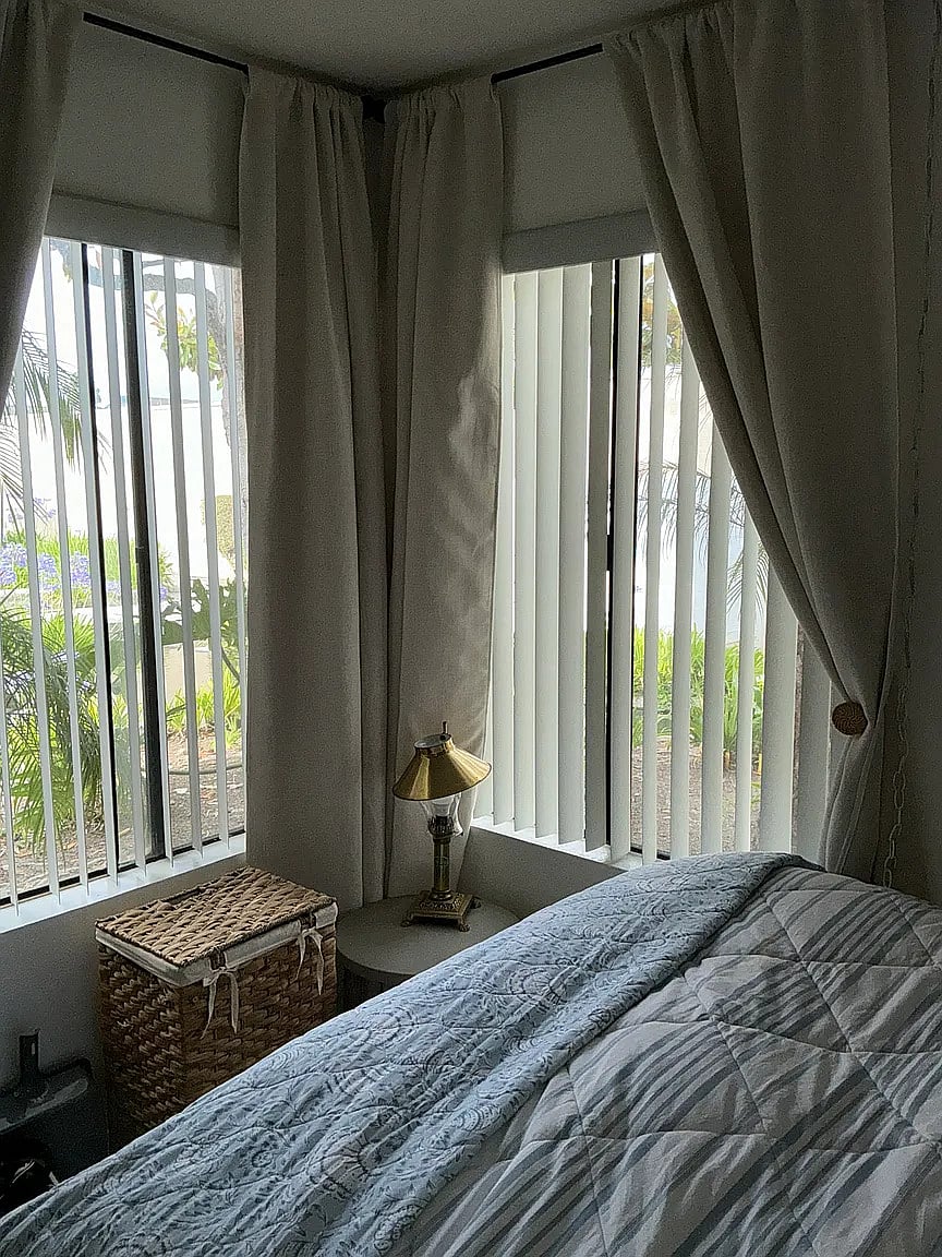Second bedroom with Queen bed, large closet, and gorgeous views of stream and landscaping.