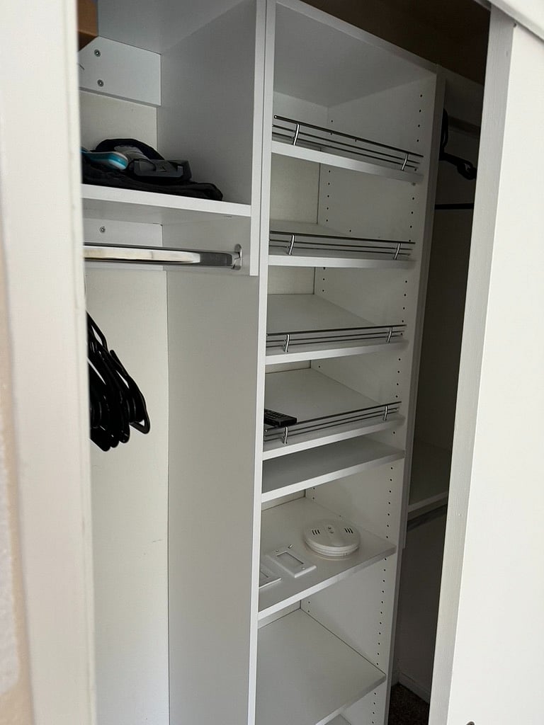 Each guest bedroom has floating closet organizers with shoe and luggage storage space