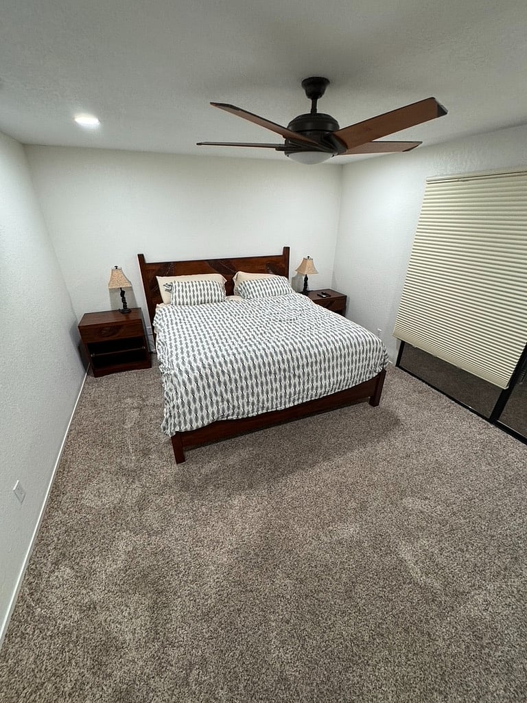 Main bedroom facing north, it is on the eas side, with black shades, top down bottom up features for light view control