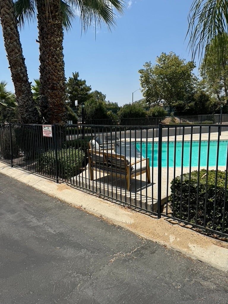 Deluxe pool, with bathrooms and shower, lounges, chaise chairs, gated locked