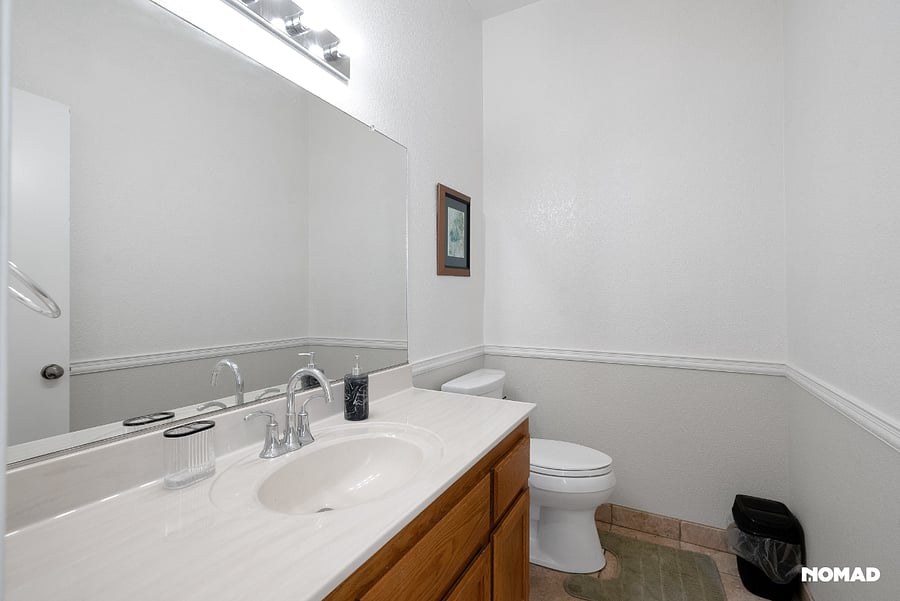 Restroom bath, on main livingt floor has dimmable lights, extra quite exhaust fans two sinks, commodes have soft close seats and lids