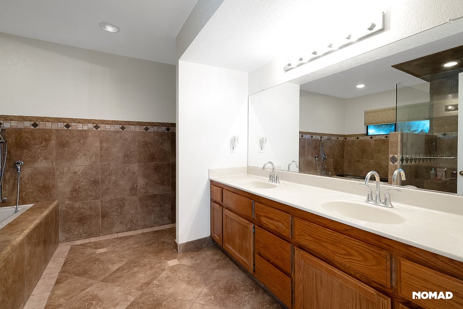 Bath has dimmable lights, extra quite exhaust fans two sinks, commodes have soft close seats and lids