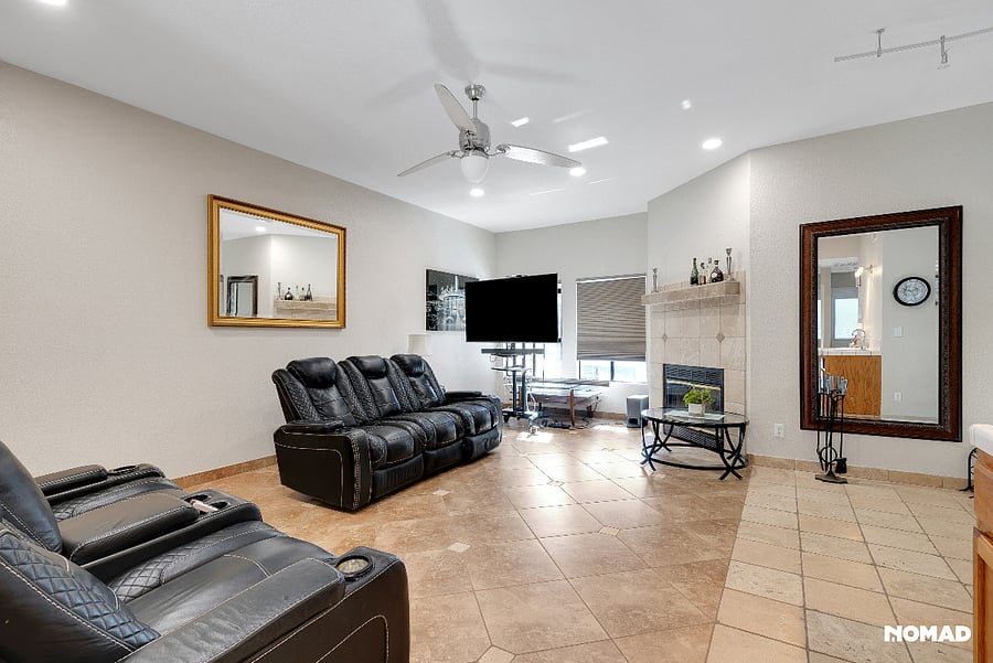 Main living room area open, Casa Blanca programable ceiling fan, recessed ligthting on dimmers throughout the main living floor.