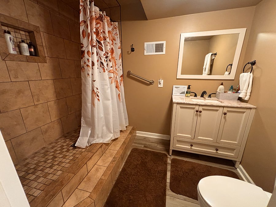 This walk up shower provides a spacious  and luxurious spot to wash the day away