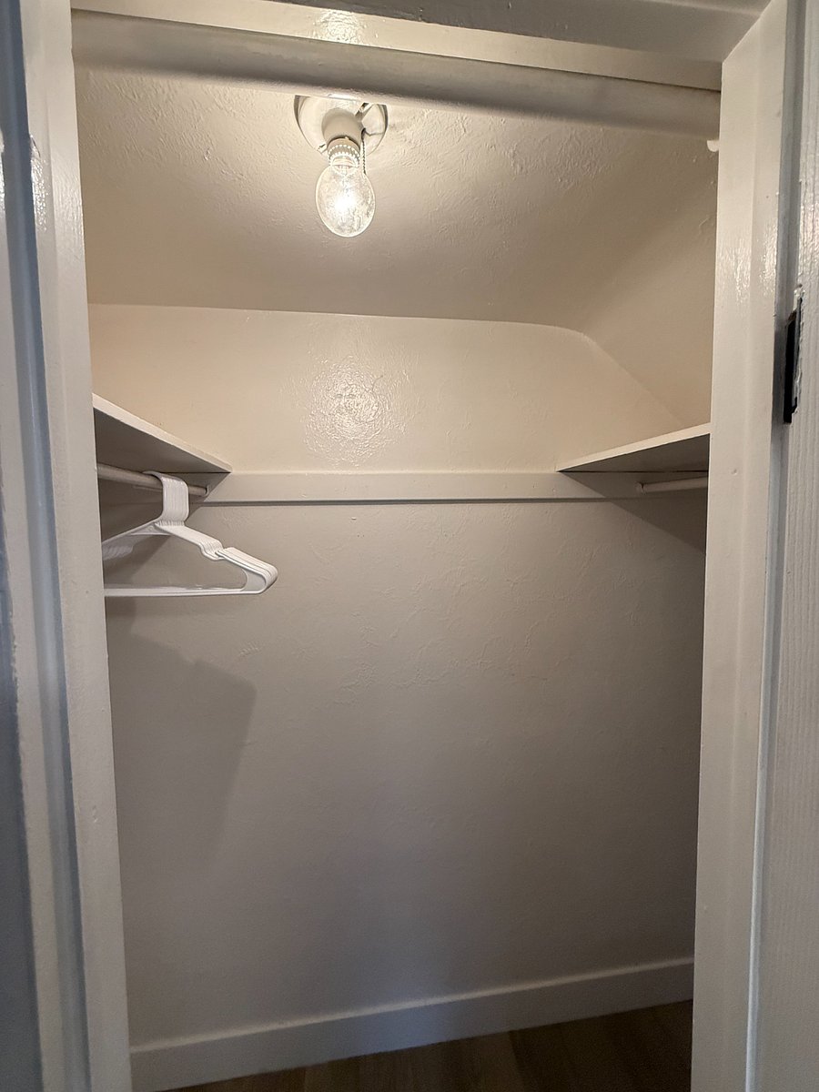 Walk in closet in bedroom