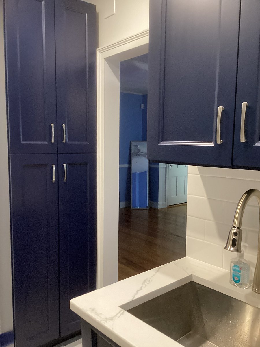 EXTRA KITCHEN CABINET SPACE FOR PANTRY AND STORAGE FOR CLEANING & LAUNDRY SUPPLIES.