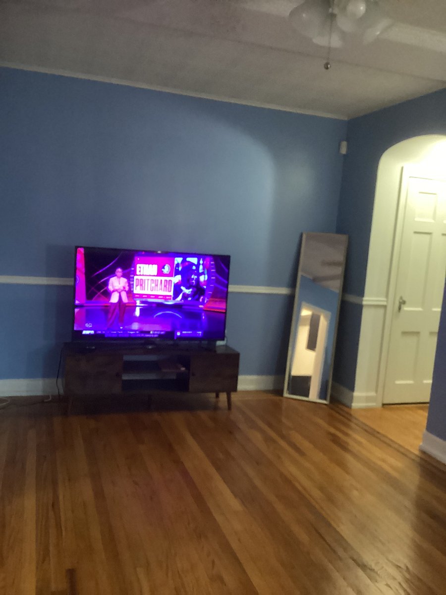 SMART 48 INCH TV AND FULL LENGTH MIRROR AND LINEN CLOSET.