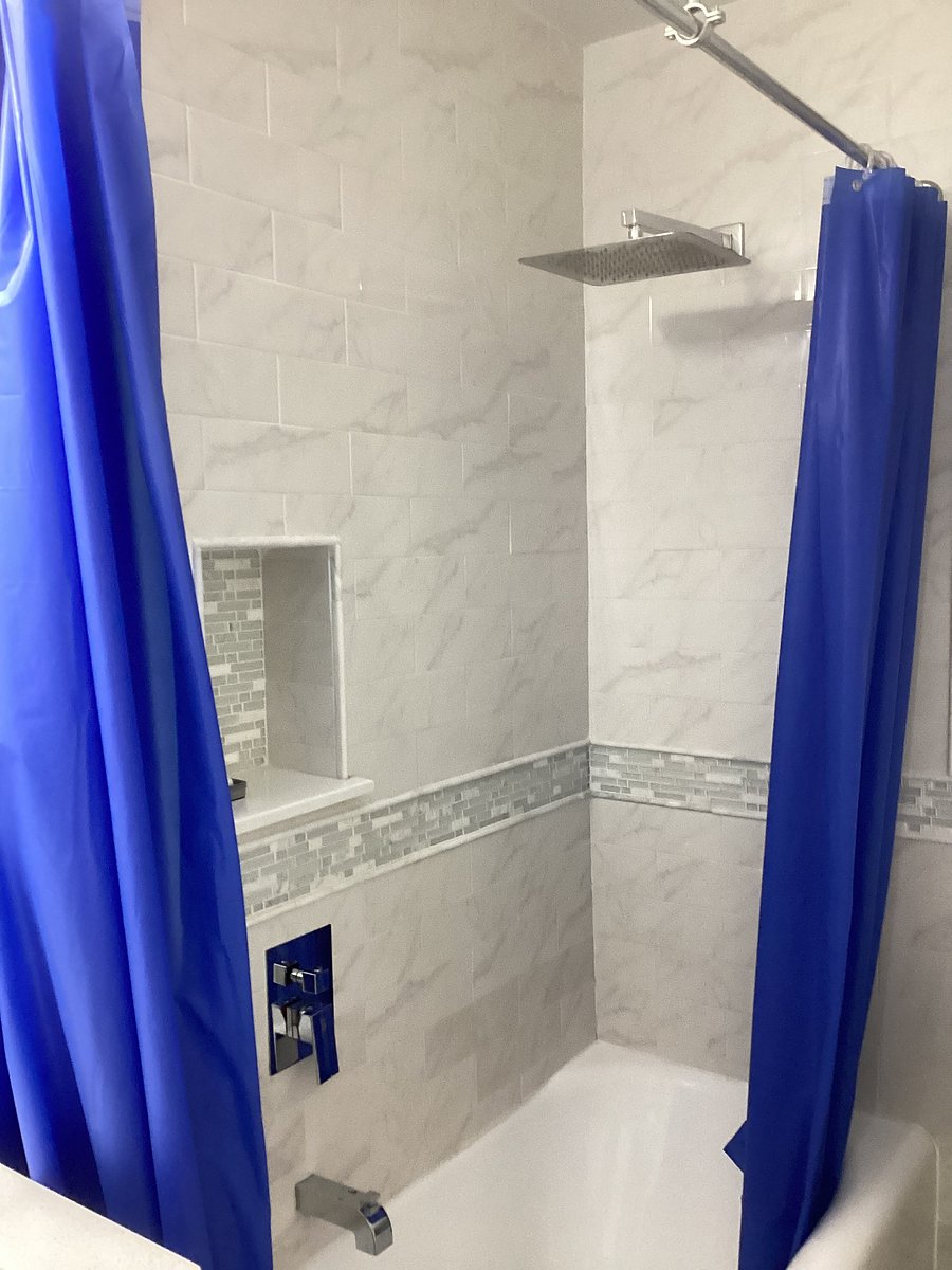 RAINSHOWER HEAD FOR SOOTHING MUSCLES AND ENTIRE BODY WASH OR SOAK IN CAST IRON TUB FOR BUBBLE BATH.