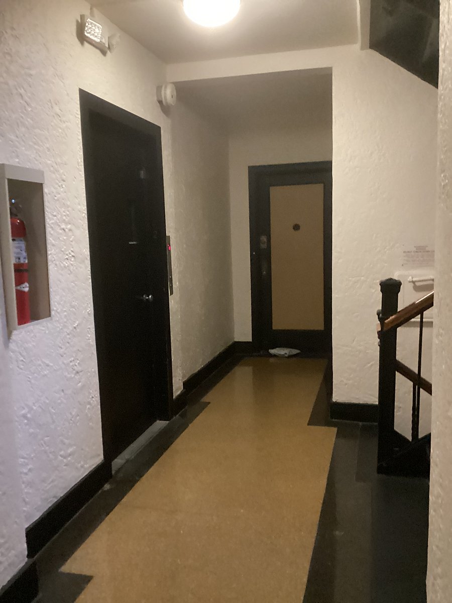 STAIRS OR ELEVATOR TO 2ND FLOOR OF APARTMENT.