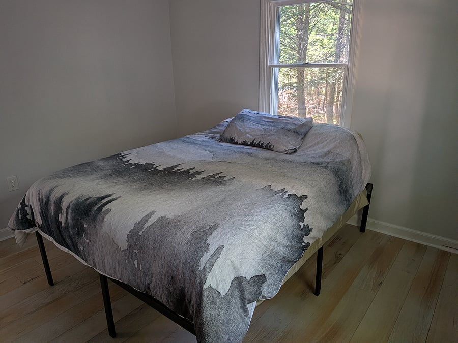 Primary Bedroom - Queen bed Black out curtains are on order.