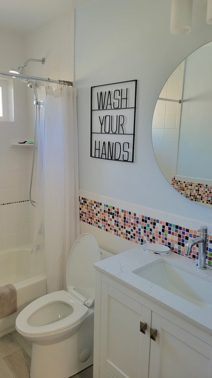 Newly updated main bathroom with dual shower heads