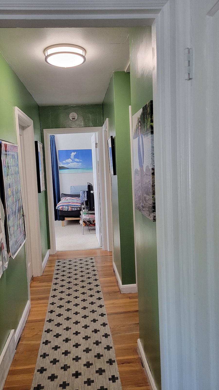 The room at the end of the hallway.