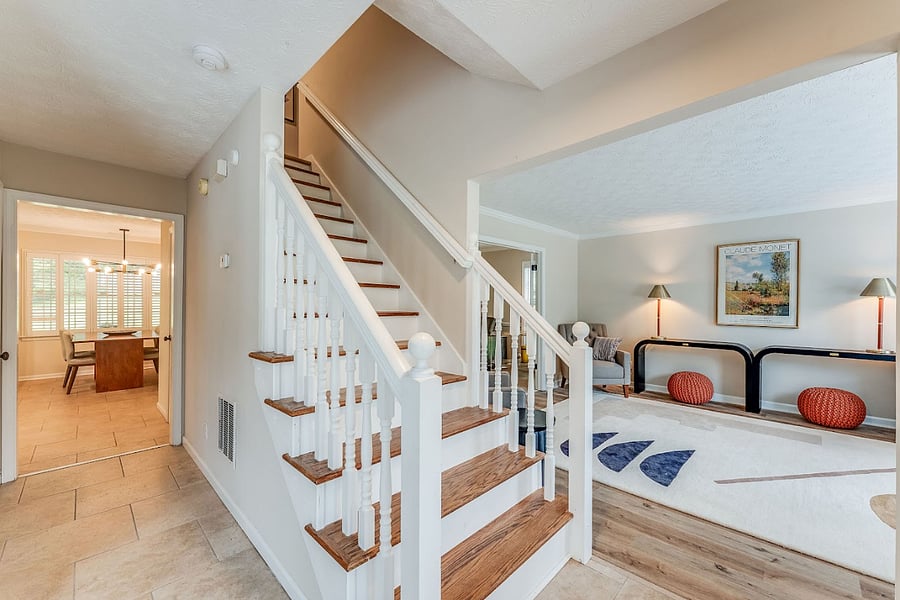 Foyer Stairs and View of Living Room