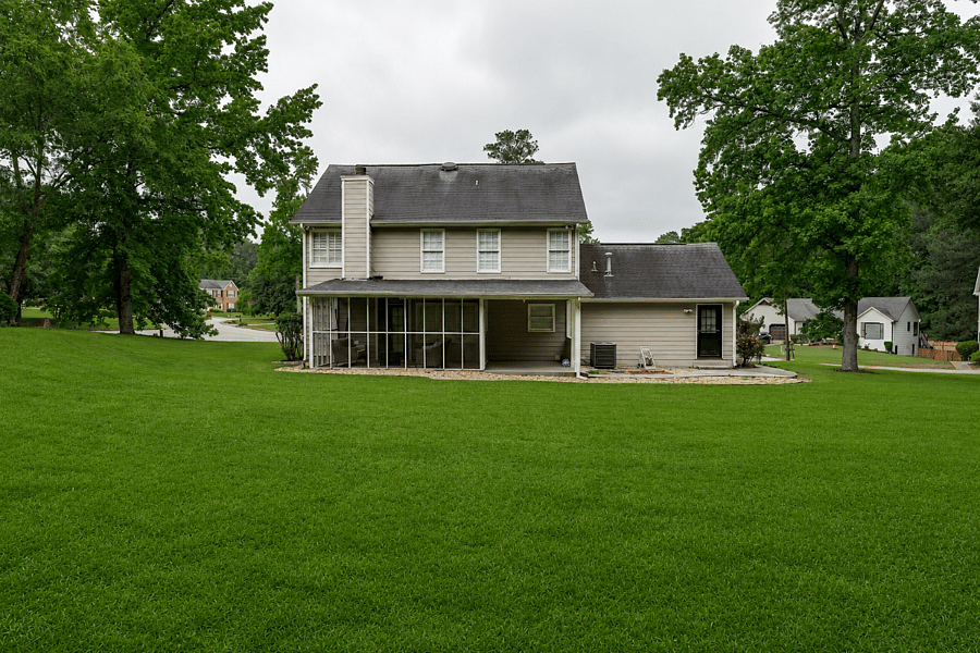 View of Back of home and Backyard