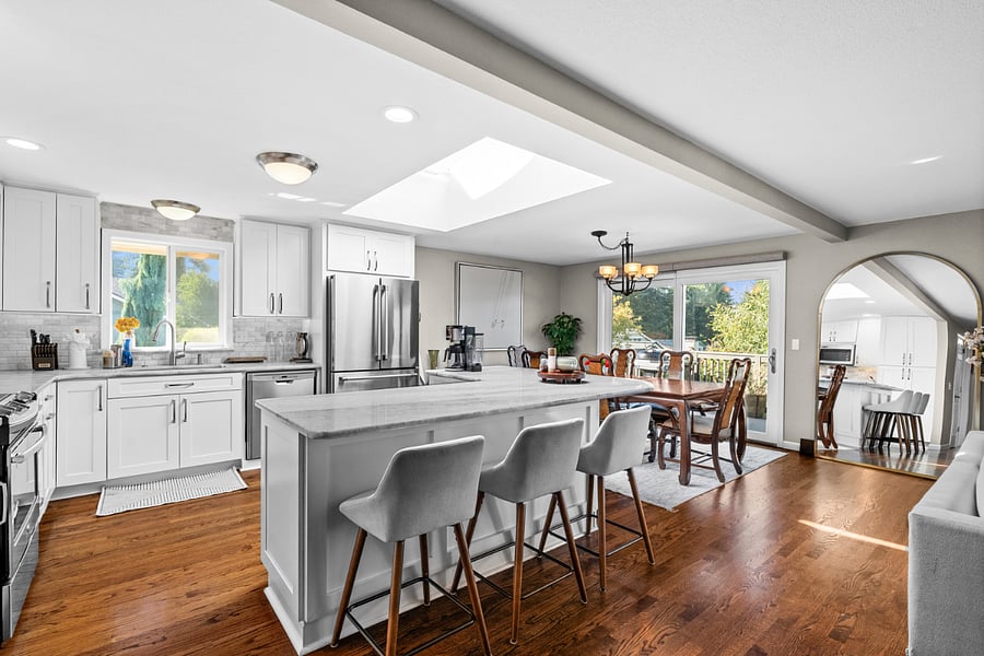 The open concept kitchen and dining area creates a bright, spacious, and inviting space to cook, enjoy meals, or gather and relax.  The kitchen is thoughtfully equipped with essentials.  