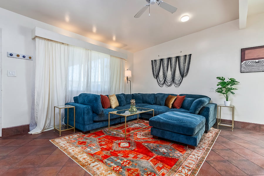 Living Room: Settle into the roomy sectional after a day at the beach