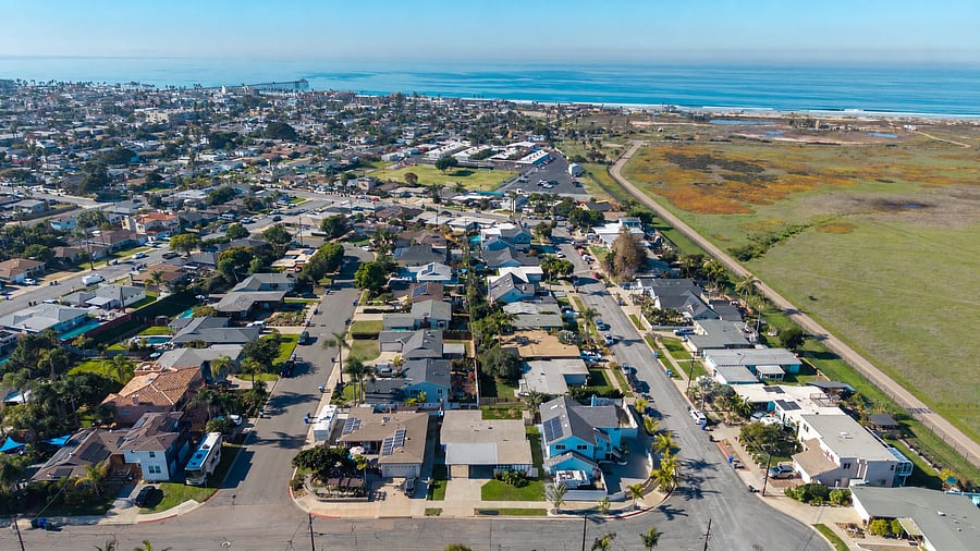 Coastal living with the ocean, neighborhood amenities, and open spaces just moments away
