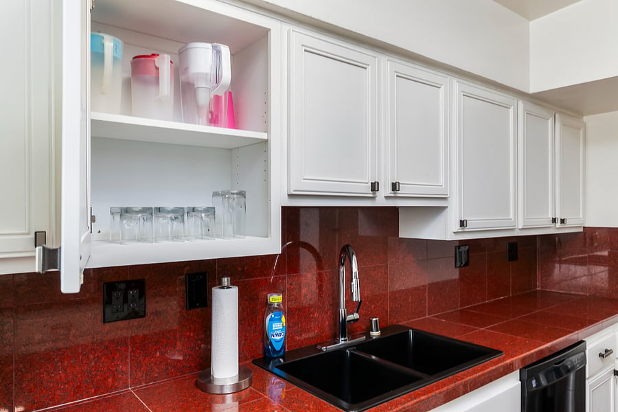 Kitchen: Kitchen storage includes glassware, lots of appliances, and everyday essentials