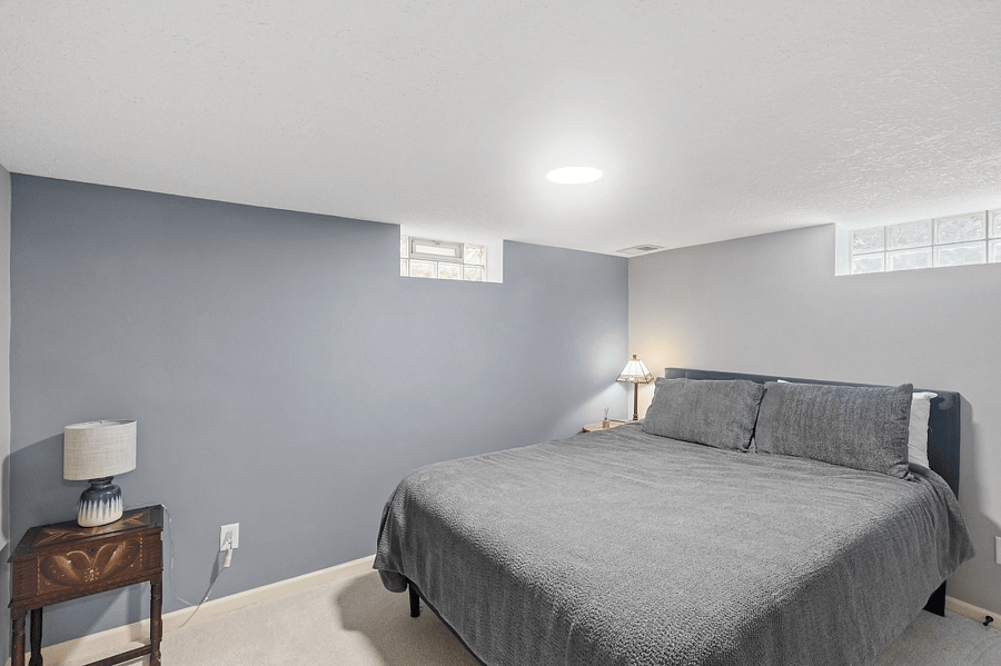 4th non-conforming bedroom, queen bed, lower level. Large walk in closet. Can move furniture.