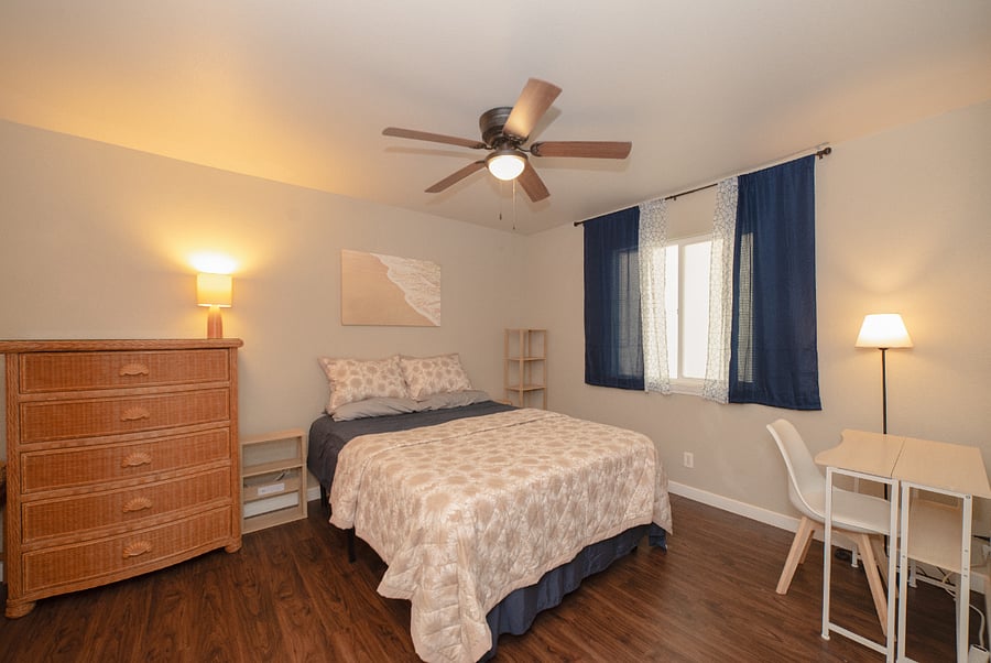 Queen Size bed and computer desk. Plenty of wall space to post calendars, notes, and photos.