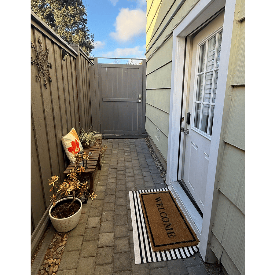 Keyless entry. Private corridor with a bench to enjoy your morning latte or enjoy reading time.
