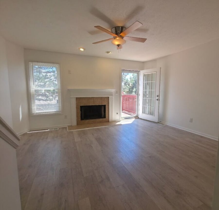 Living room with view to 2nd story deck
