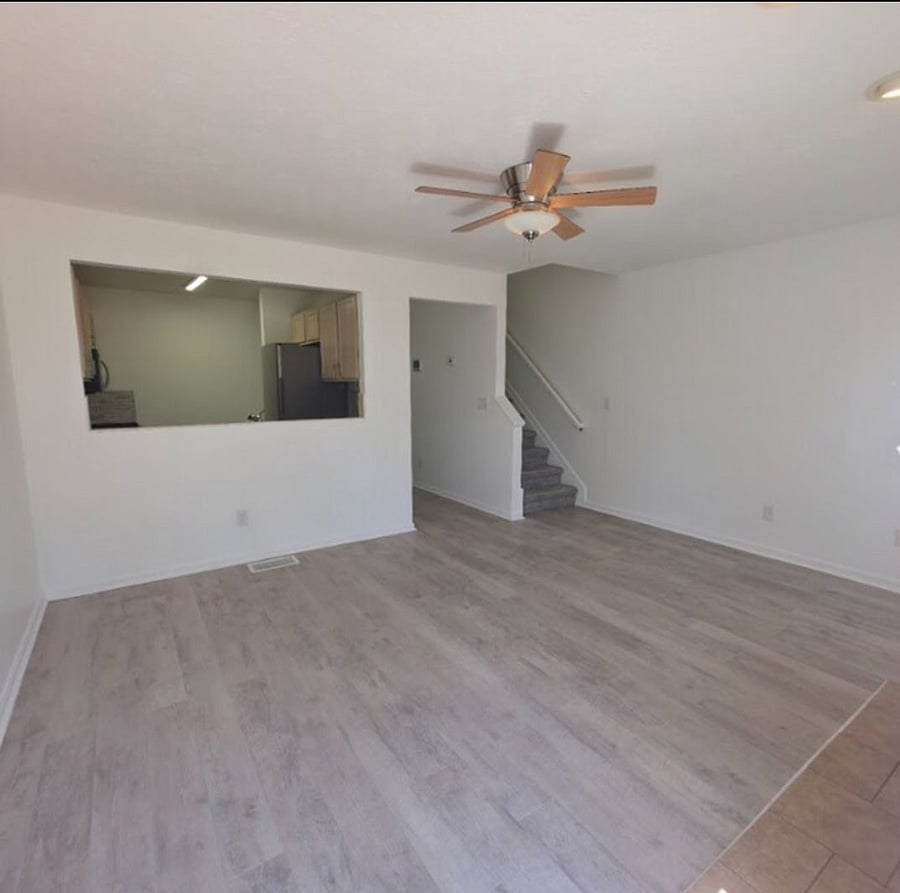 Living room with kitchen pass through view