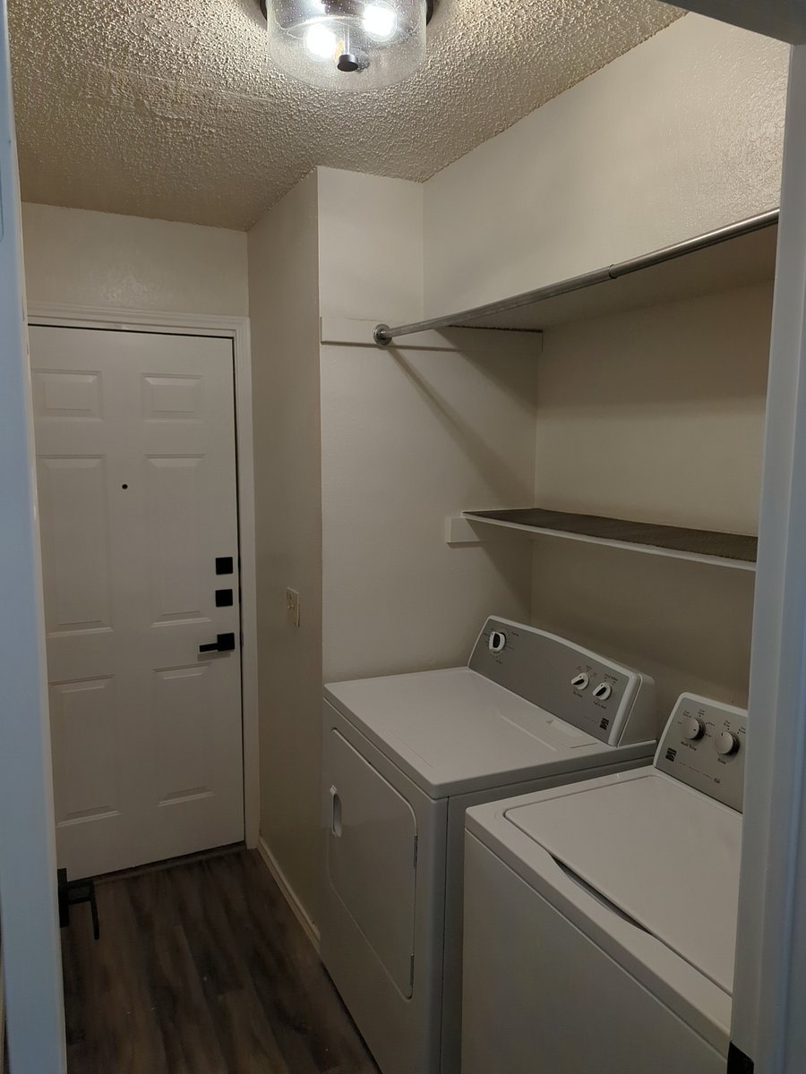 Laundry Room set up with Washer and Dryer